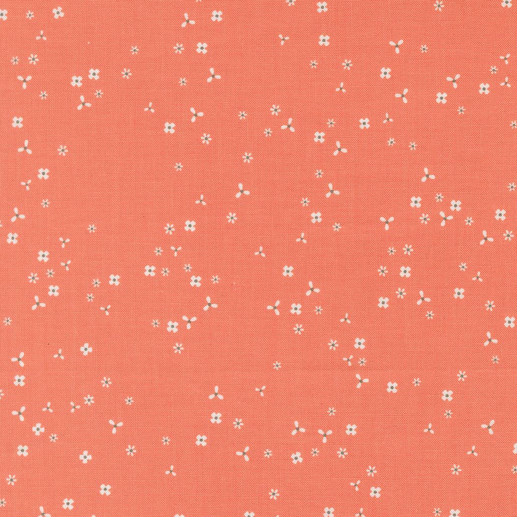 In the Garden Flutter Coral fabric with small white floral sketches on coral background by Corey Yoder for Moda Fabrics