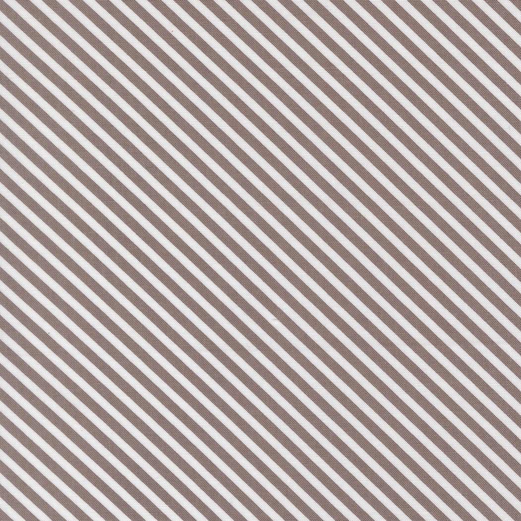 In the Garden Bias Stripe Slate fabric by Corey Yoder for Moda Fabrics with diagonal stripes in slate and white