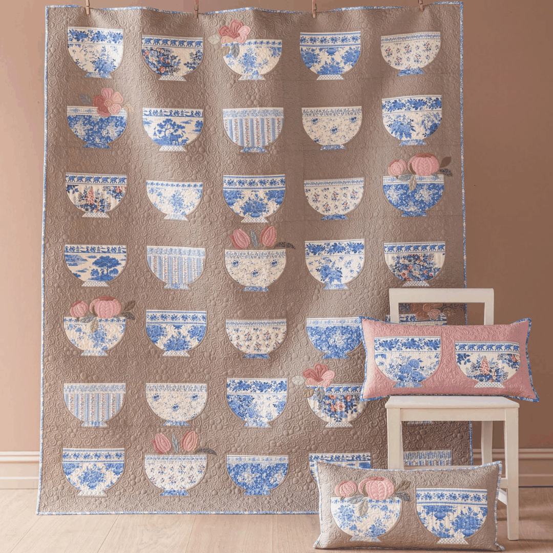 Bowl Collection Quilt Kit featuring blue and white pottery bowls appliqué in two colorways, 63.5" x 75.25"