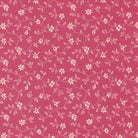Goodnight Irene fabric by Betsy Chutchian featuring delicate blossom florals on carnation pink background