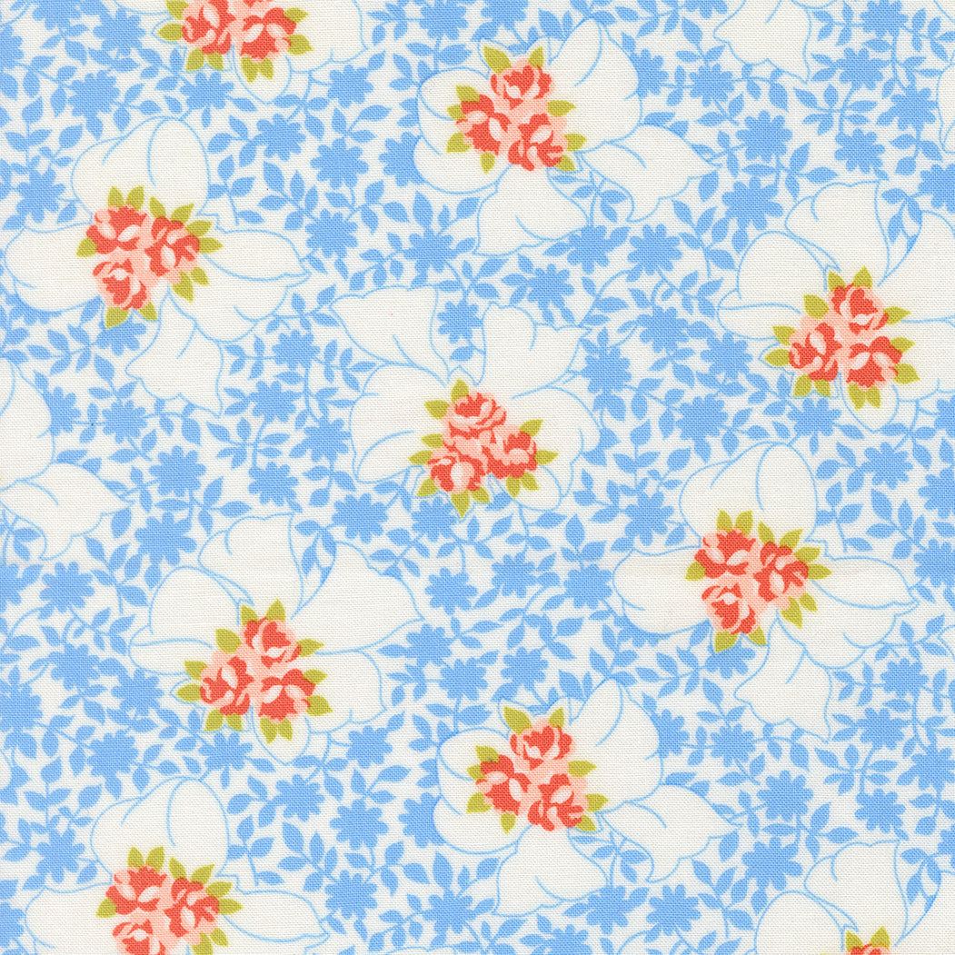 Rosie Nanas Apron fabric pattern with white flowers and red centers on blue background by Fig Tree Co.