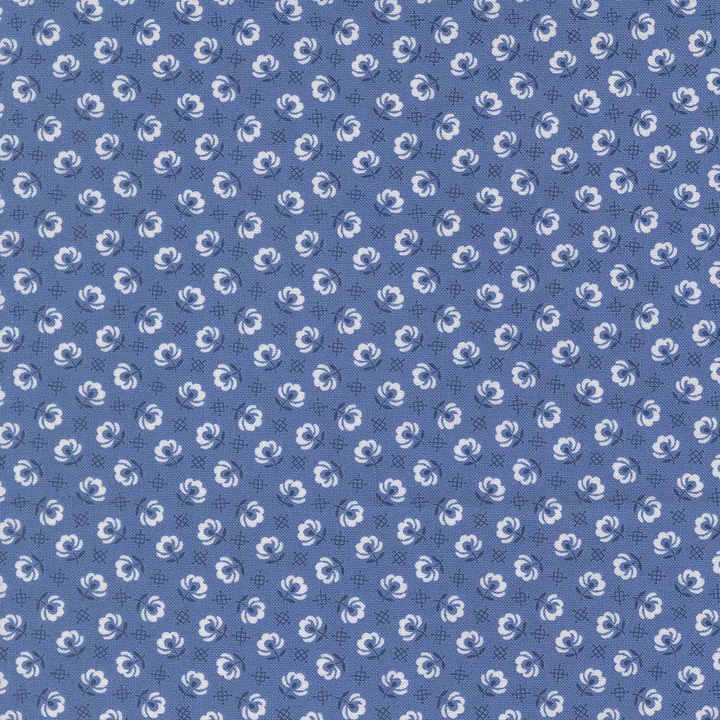 Rosie Prairie Toss Blender fabric in denim jeans blue with small floral pattern by Joanna Figueroa for Moda Fabrics