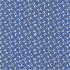 Rosie Prairie Toss Blender fabric in denim jeans blue with small floral pattern by Joanna Figueroa for Moda Fabrics