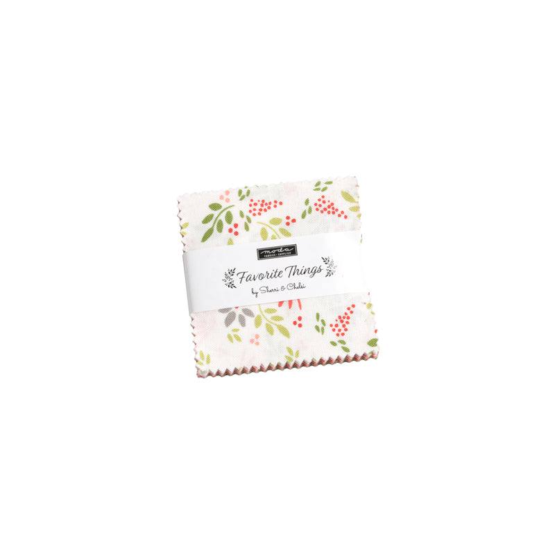 Favorite Things Mini Charm Pack by Sherri & Chelsi with festive Christmas fabrics including dots, florals, plaids, and stripes