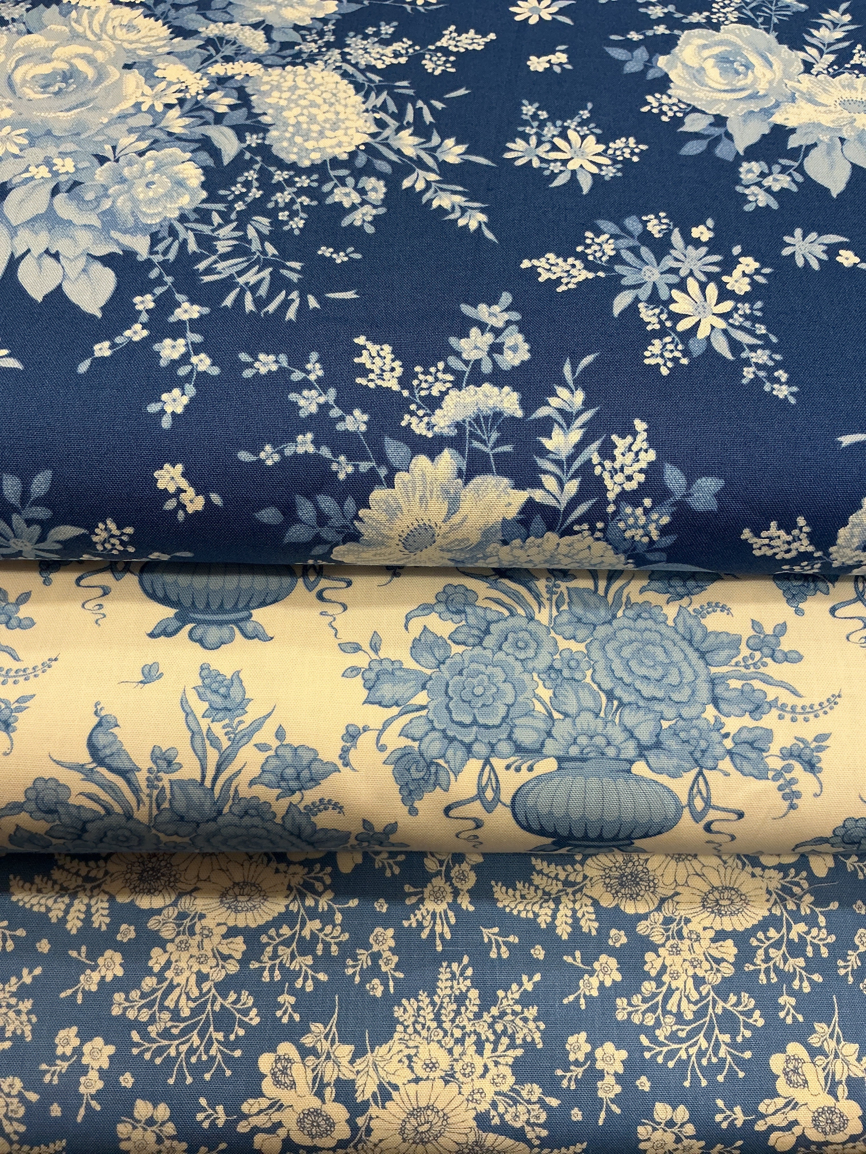 Three coordinating fabrics in a 3 Yard Quilt Bundle from Bella Rose Quilts for quilting and sewing projects