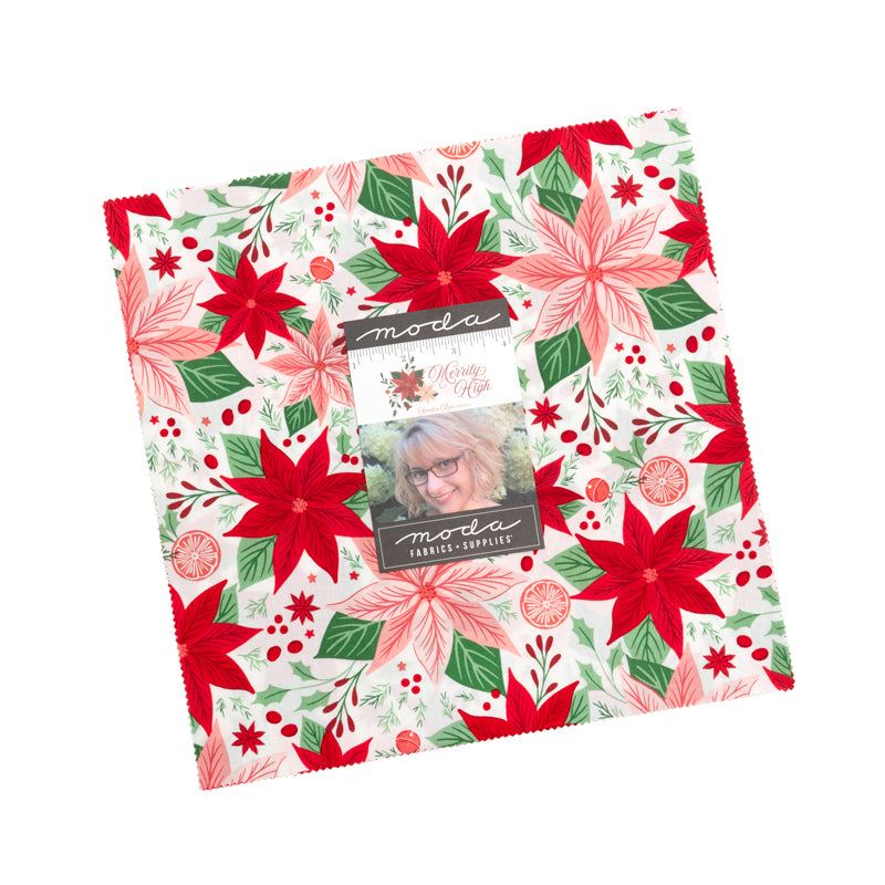Sweetfire Road Merrily On High Layer Cake fabric featuring Christmas-themed prints of gingerbread, candy canes, poinsettias, holly, and snowflakes by Moda Fabrics