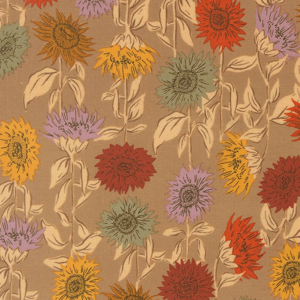 Close-up of Windfall Sunflower Field oatmeal fabric by Stephanie Sliwinski for Moda Fabrics showing autumn-inspired sunflower and leaf pattern