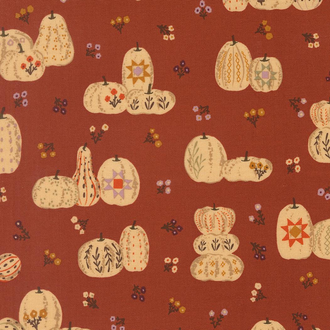 Windfall Pumpkin Patches Rust fabric by Stephanie Sliwinski with autumnal pumpkin and leaf designs on rust background