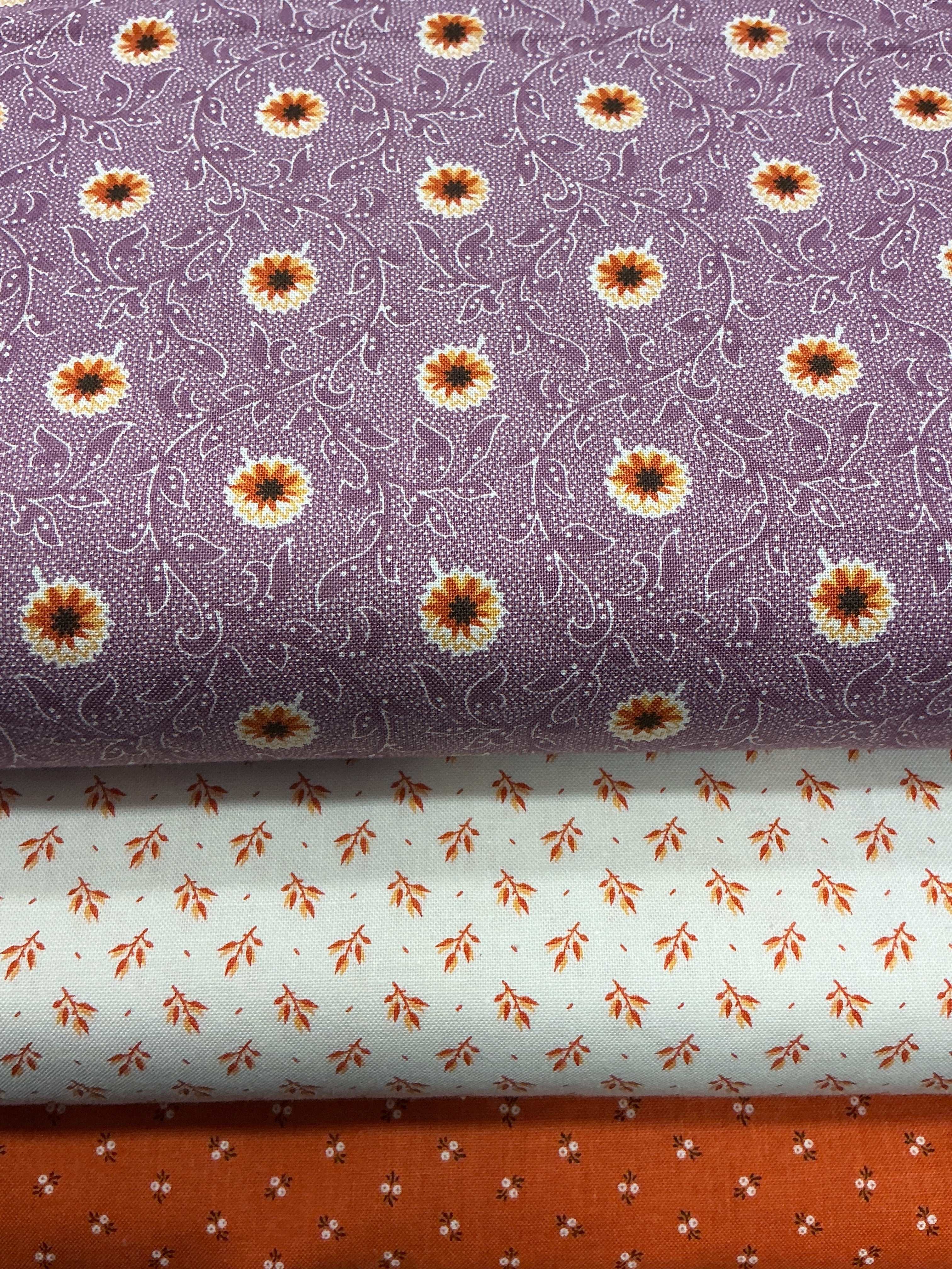Three coordinating fabrics from Bella Rose Quilts 3 Yard Quilt Bundle for quilting and sewing projects