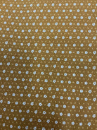 Fabric rolls labeled 5-yard cuts on sale