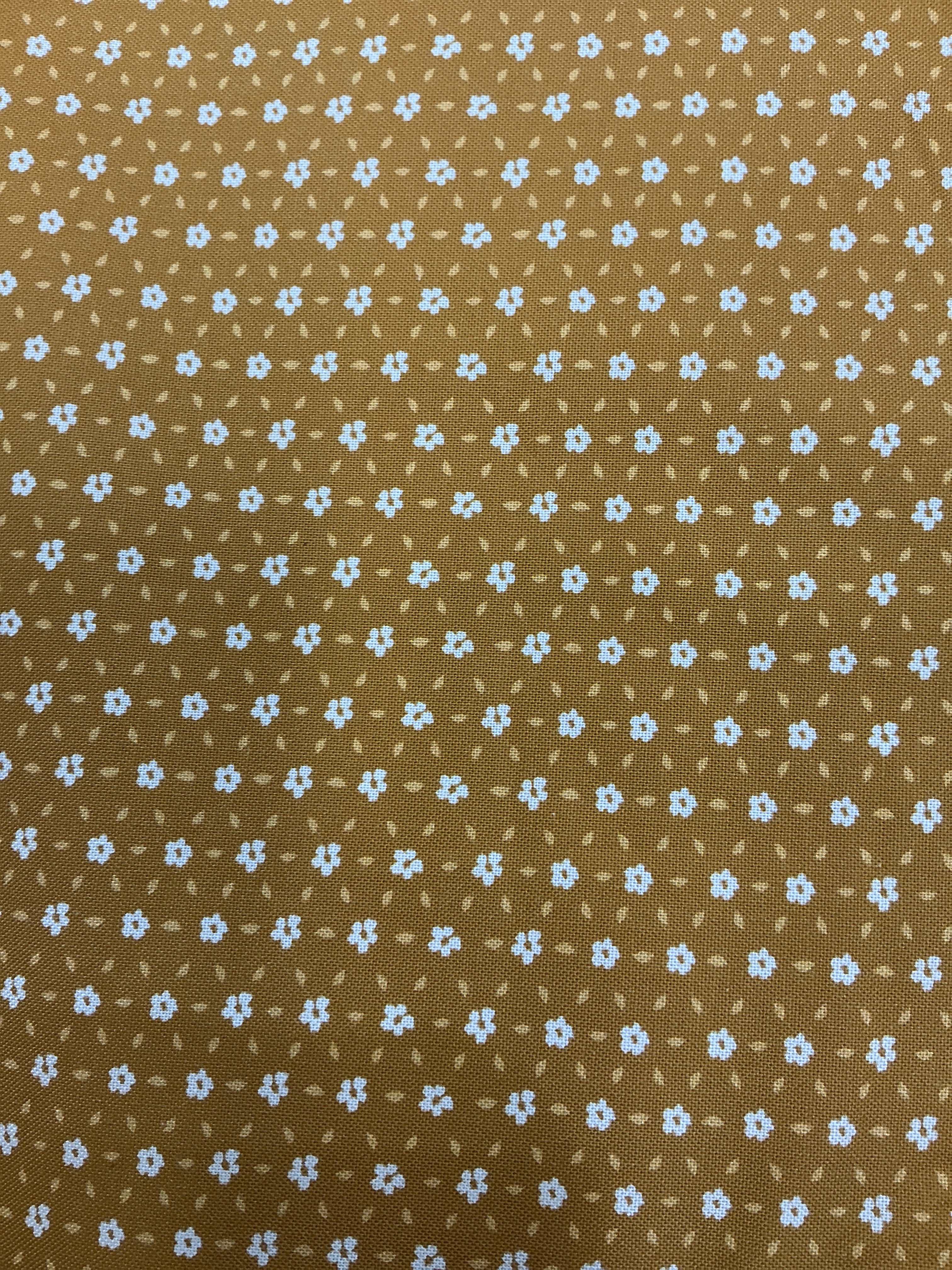 Fabric rolls labeled 5-yard cuts on sale