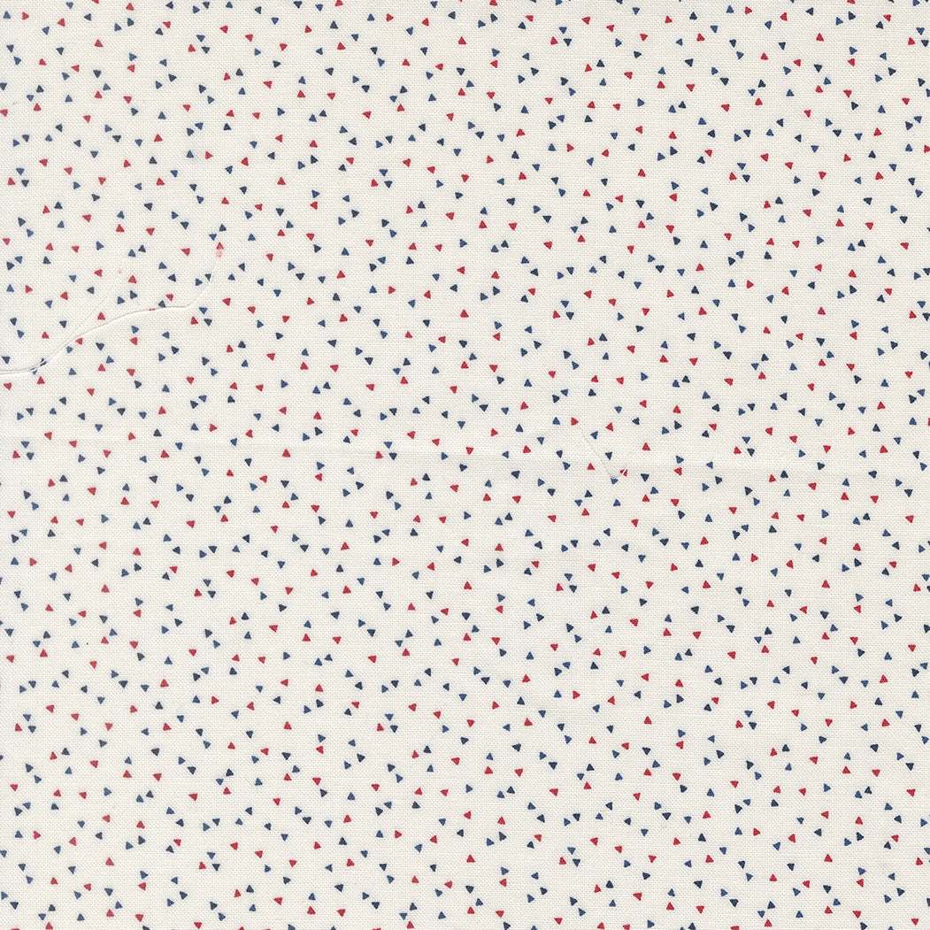 American Gatherings III Confetti Blender Cloud fabric by Primitive Gatherings for Moda Fabrics with small red and blue confetti on white background