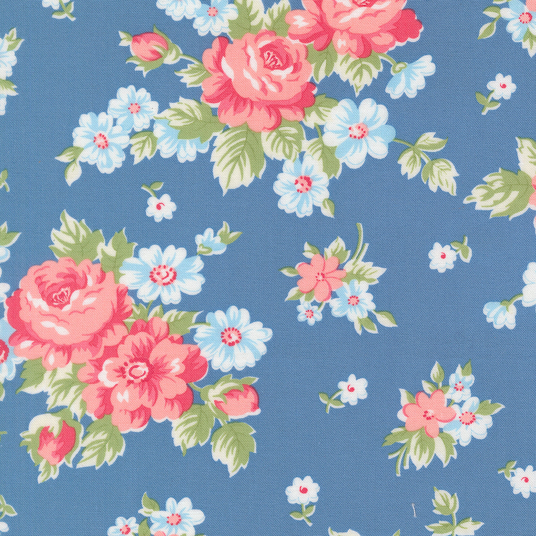 A Cat Named Stitch fabric featuring blooming florals and cabbage rose design by Camille Roskelley for Moda Fabrics