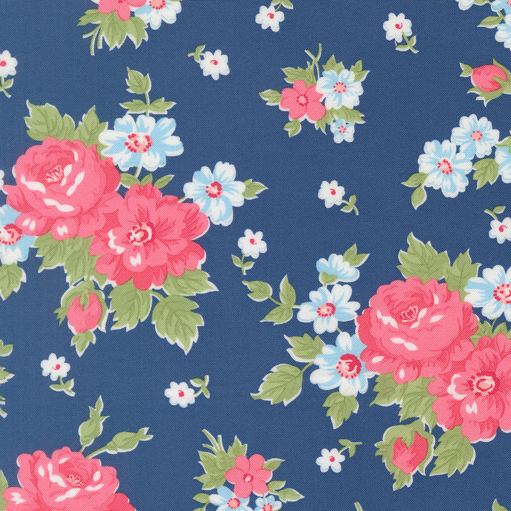 A Cat Named Stitch fabric featuring blooming florals and cabbage rose design by Camille Roskelley for Moda Fabrics