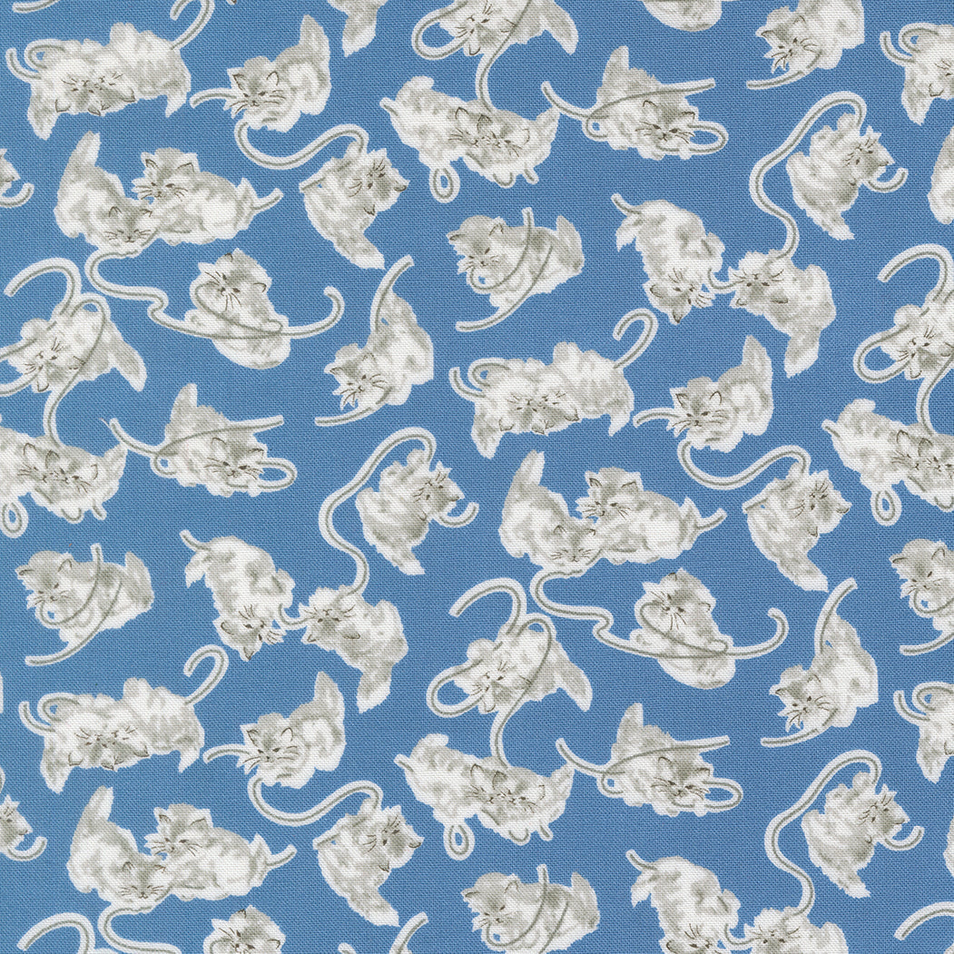 Blue kitten fabric pattern by Camille Roskelley featuring novelty cat Georgie from Moda Fabrics