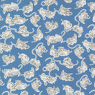 Blue kitten fabric pattern by Camille Roskelley featuring novelty cat Georgie from Moda Fabrics
