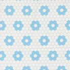 A Cat Named Stitch quilted hexagon fabric by Camille Roskelley featuring geometric cream and sky patterns