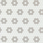 A Cat Named Stitch quilt fabric by Camille Roskelley featuring geometric cream and grey hexagons