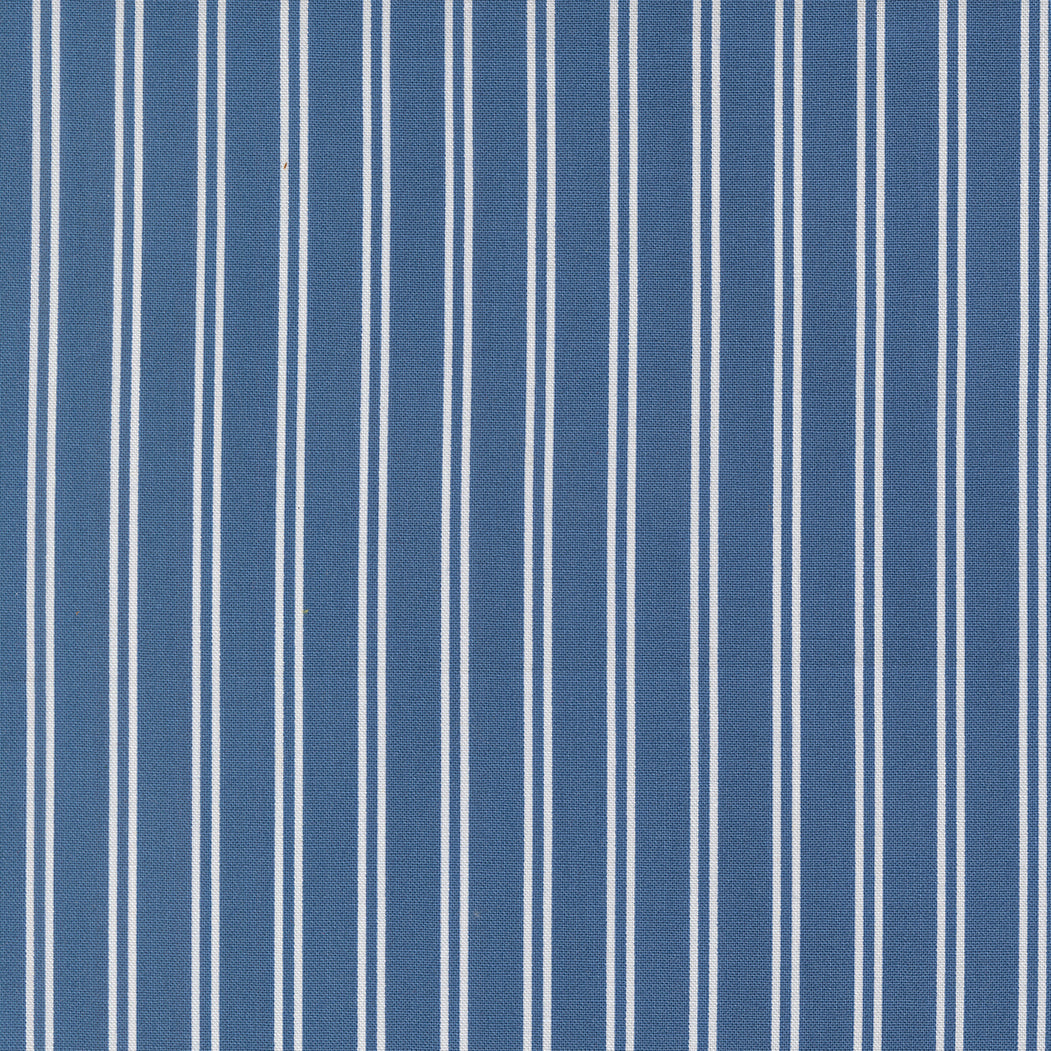 A Cat Named Stitch fabric design featuring colorful stripes by Camille Roskelley for Moda Fabrics