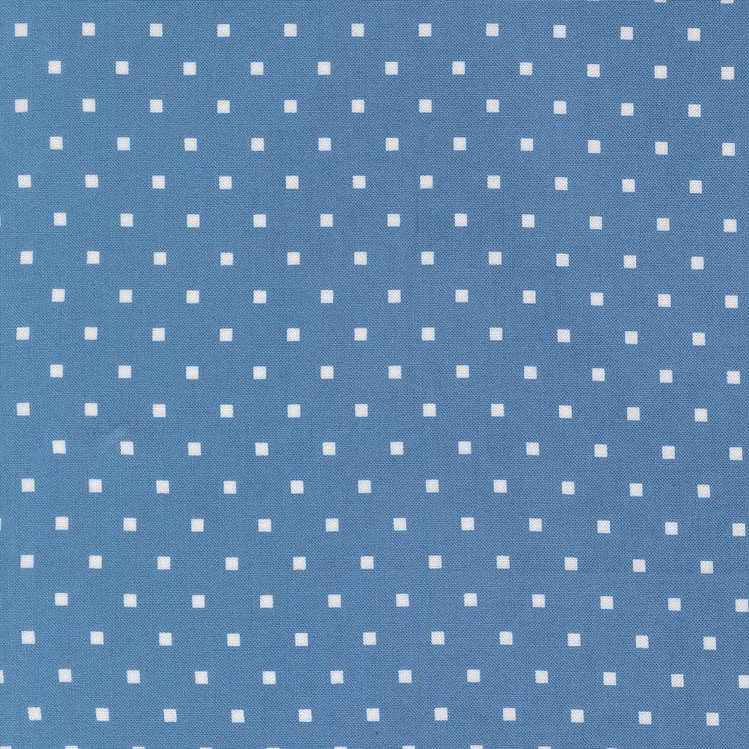 Blue Cosmo Dot fabric from A Cat Named Stitch quilt collection by Camille Roskelley