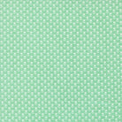 Green floral fabric "A Cat Named Stitch" by Camille Roskelley featuring tulip prints from Moda Fabrics