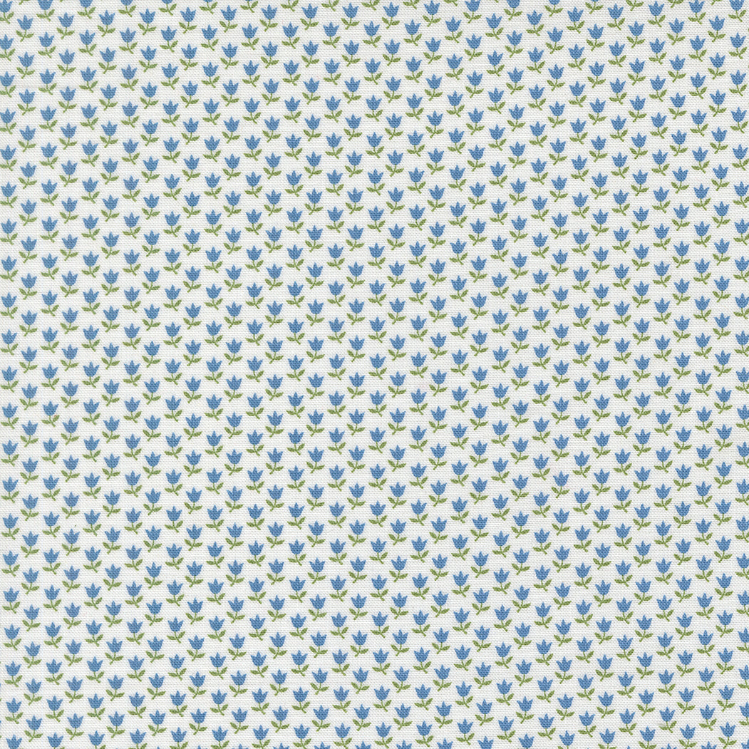 A Cat Named Stitch fabric with small floral tulip cream blue pattern by Camille Roskelley for Moda Fabrics