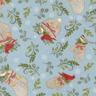 Cardinal and chickadee in cozy winter wear with greenery and jingle bells on festive fabric pattern