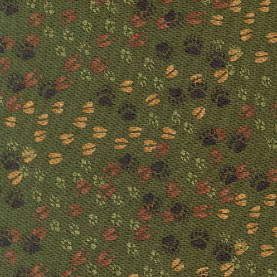 Northwoods Lodge fabric pattern with animal tracks and pine trees by Deb Strain in earth tones