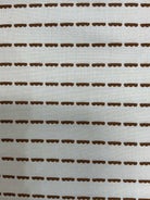 5-yard cuts of fabric on sale with smiling tags