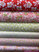 Six-Pack Party Bundle fabric cuts for quilting projects arranged flat