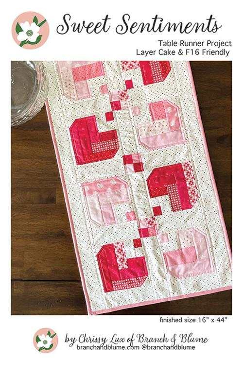 Sweet Sentiments Table Runner with pink and red heart quilt design by Chrissy Lux