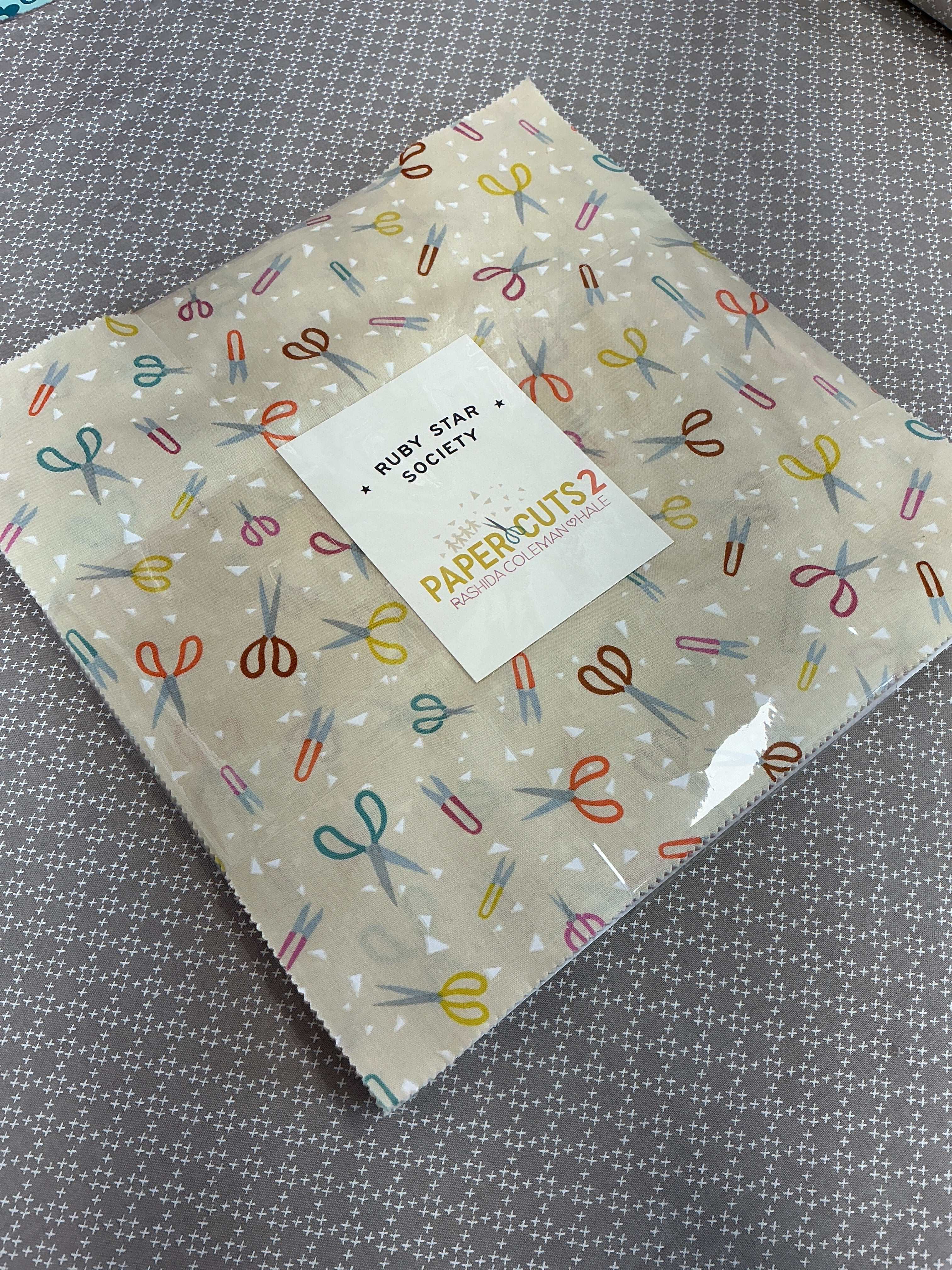 Frida Lap Size Quilt Kit with 12 half-yard fabric cuts, free digital pattern, accent and binding included for sewing a lap-size quilt