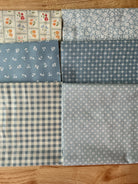 Six quarter yard fabric cuts in assorted colors from My Sew Quilty Life by Heather Briggs