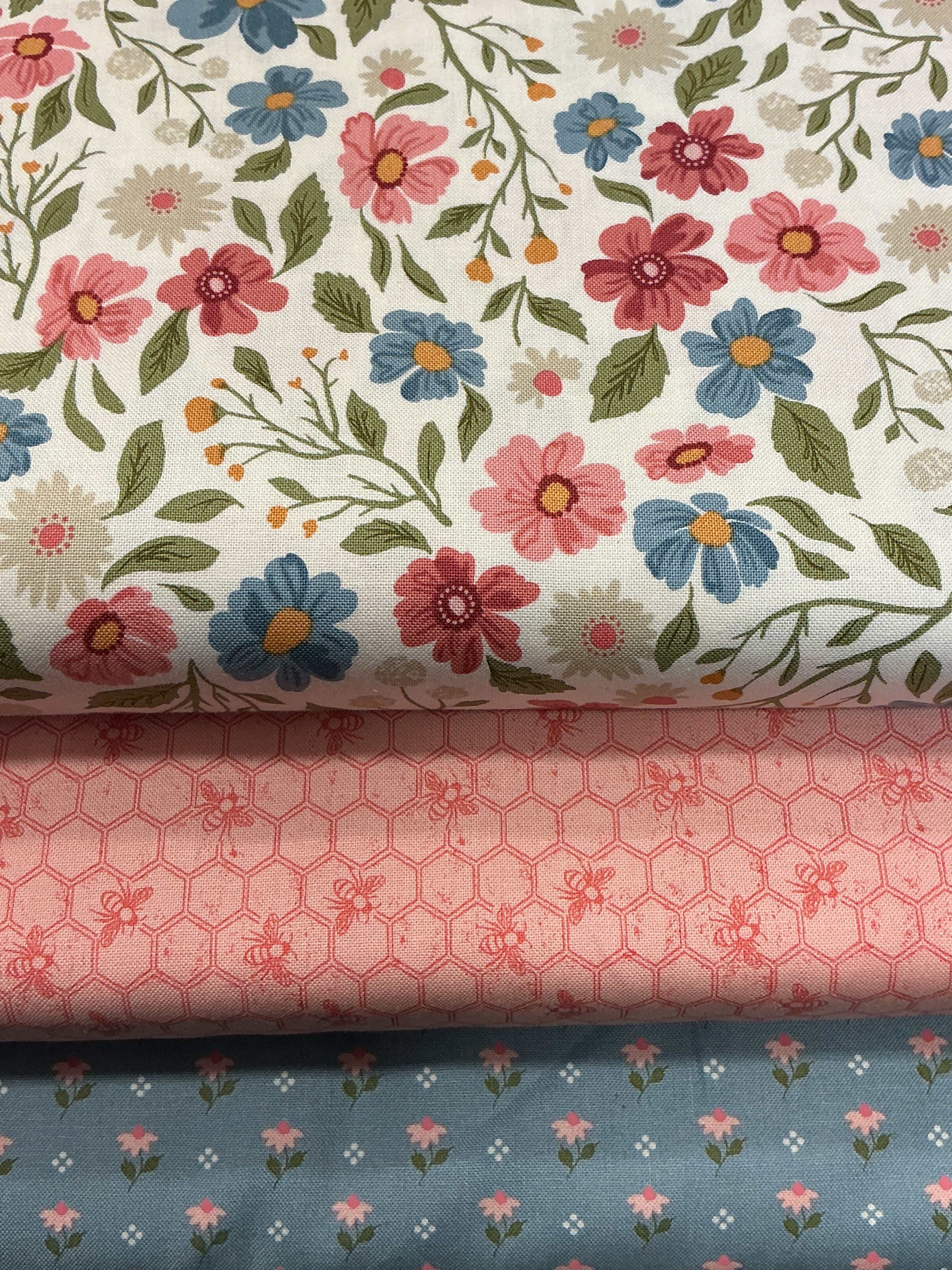 Three coordinating fabrics in a 3 Yard Quilt Bundle from Bella Rose Quilts for quilting and sewing projects
