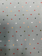 Rolls of fabric labeled 5-yard Cuts on sale display