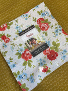 Frida Lap Size Quilt Kit with half-yard fabric cuts, free pattern, accent, binding, and video access for sew-along project