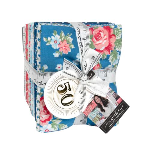 A Cat Named Stitch fabric bundle by Camille Roskelley featuring vintage florals, stripes, dots, and kitten prints in soft colors