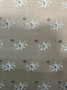 Rolls of fabric labeled 5-yard cuts for sale