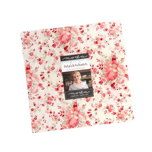 Petals and Polka Dots Layer Cake fabric squares by Anne Sutton for Moda Fabrics in red, pink, and white floral and polka dot patterns