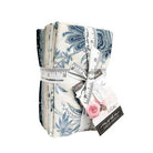 Breathtaking Blues Fat Eighth Bundle by 3 Sisters featuring 30 blue and cream fabric pieces tied with Moda Fabrics ribbon