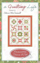 Poinsettia Stars BOM Pattern quilt with 12 star blocks and sashing by Sherri McConnell