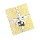 Pre-order Gathered Bonbons Half Yard Bundle by Jen Kingwell Designs with 8 coordinated fabric pieces wrapped with Moda measuring tape ribbon
