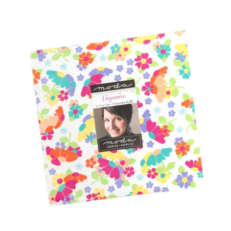 Joysome Layer Cake by Corey Yoder featuring 42 pre-cut floral and print fabric squares for quilting