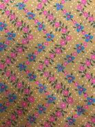 5-yard Cuts fabric sale display with variety of colorful fabrics