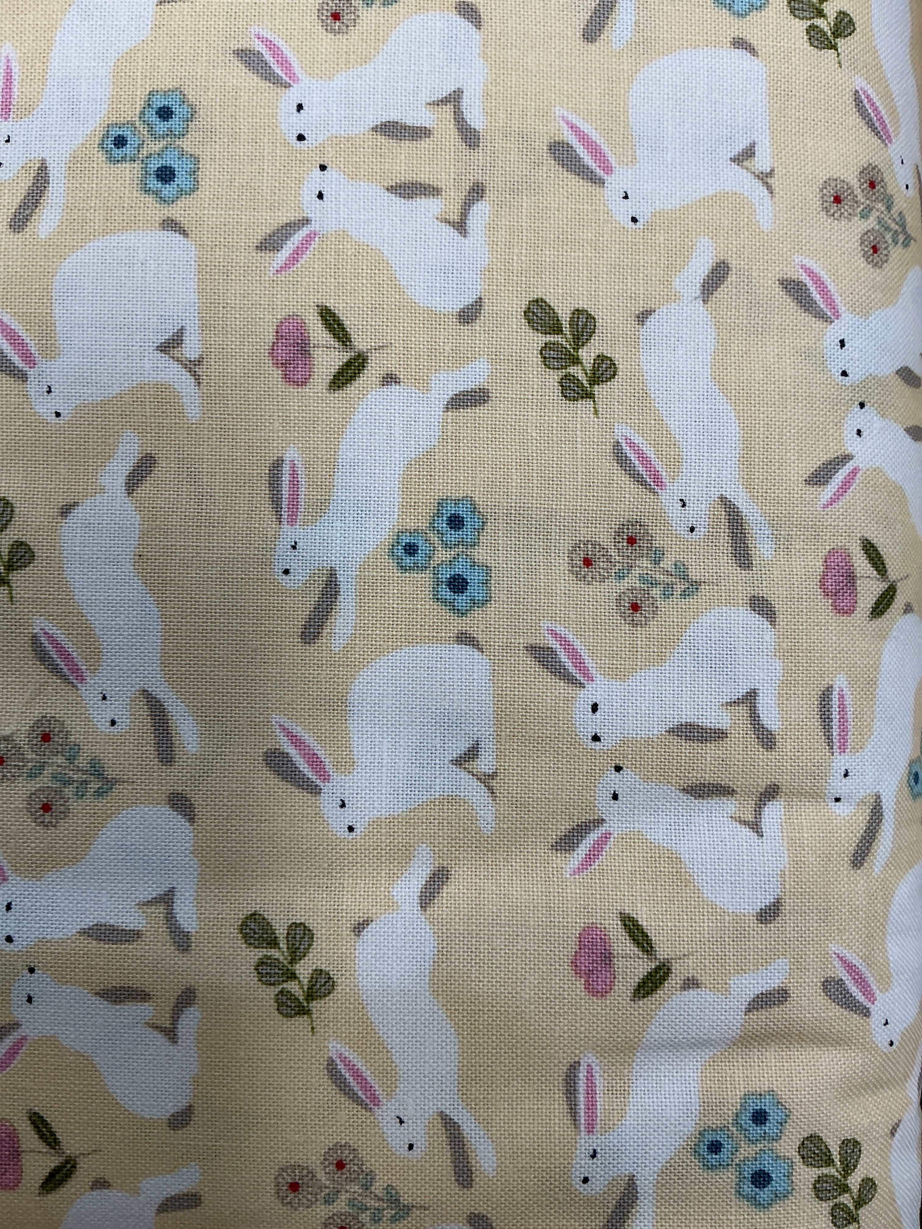 Stack of 5-yard cuts fabric on sale with varied colors