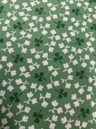 Stack of colorful 5-yard fabric cuts on sale