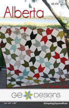 Alberta 10" Square Pattern quilt with assorted squares and background fabric displayed
