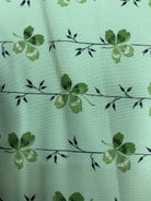 Stack of colorful 5-yard fabric cuts for sale