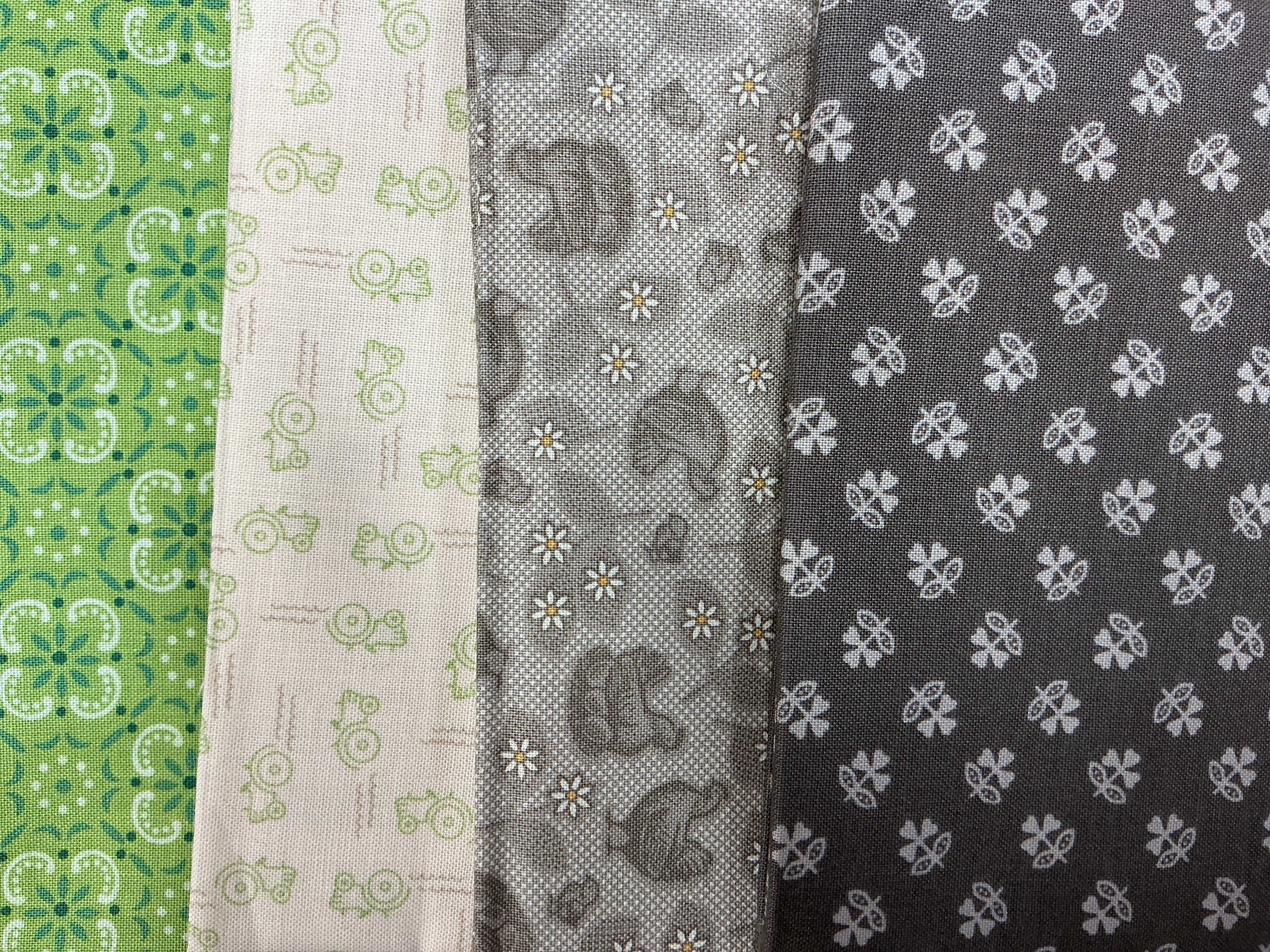 4 Yard Quilt Bundle with green and grey patterned fabric pieces for quilting projects