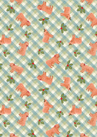 Celtic Christmas fabric with Highland cows, holly, and gingham pattern by Lewis & Irene